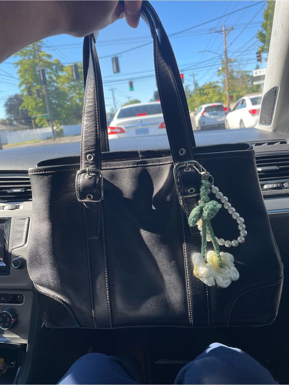 Coach Black Leather Shoulder Bag with Floral Charm